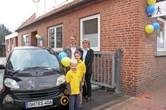 Rainer und Ingrid Swonke mit den Söhnen Finn und Ole - vor 10 Jahren bei der Eröffnung in der Hochtorstraße.