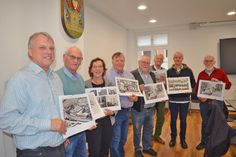 Das Lütjenburger Stadtarchiv und Bürgermeister Dirk Sohn stellen stolz den Historischen Bildkalender Lütjenburg 2025 vor. Fotos: Mielke