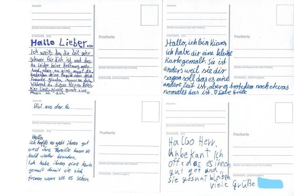 Schüler des Küstengymnasiums schreiben Grüße an Heimbewohner.