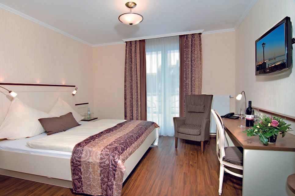 Großzügige stilvolle Zimmer, die liebevoll auf die individuellen Bedürfnisse der Gäste zugeschnitten sind.
