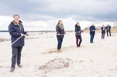 Die Bürgermeister*innen und Tourismusverantwortlichen von Timmendorfer Strand, Scharbeutz, Sierksdorf und Neustadt ziehen für die Lübecker Bucht an einem Strang.