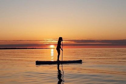 Eine morgendliche SUP Tour - fotografiert von Cindy Harling.