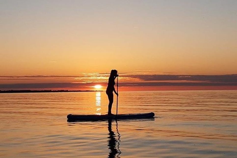 Eine morgendliche SUP Tour - fotografiert von Cindy Harling.