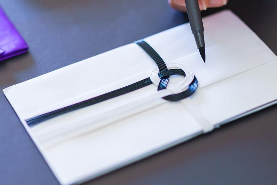 Eine handgeschriebene Karte wirkt immer persönlicher als eine digitale Nachricht.