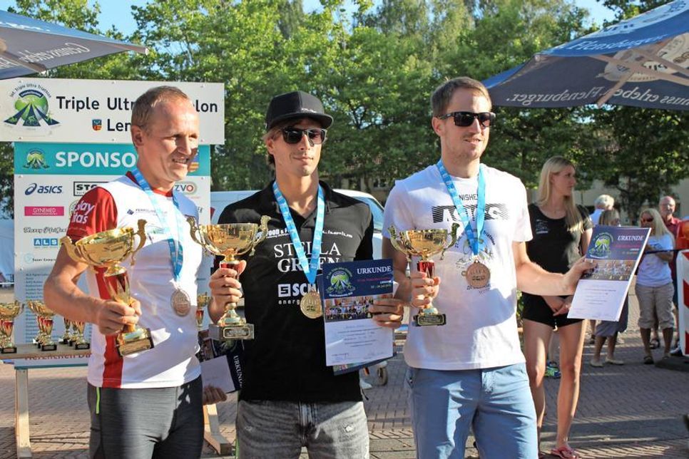 Rait Ratasepp, Robert Karas und Henning Olsrud (v. lks.).