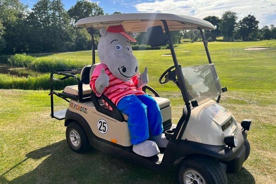 Golfi - das Maskottchen im Golfimobil Clubcart.