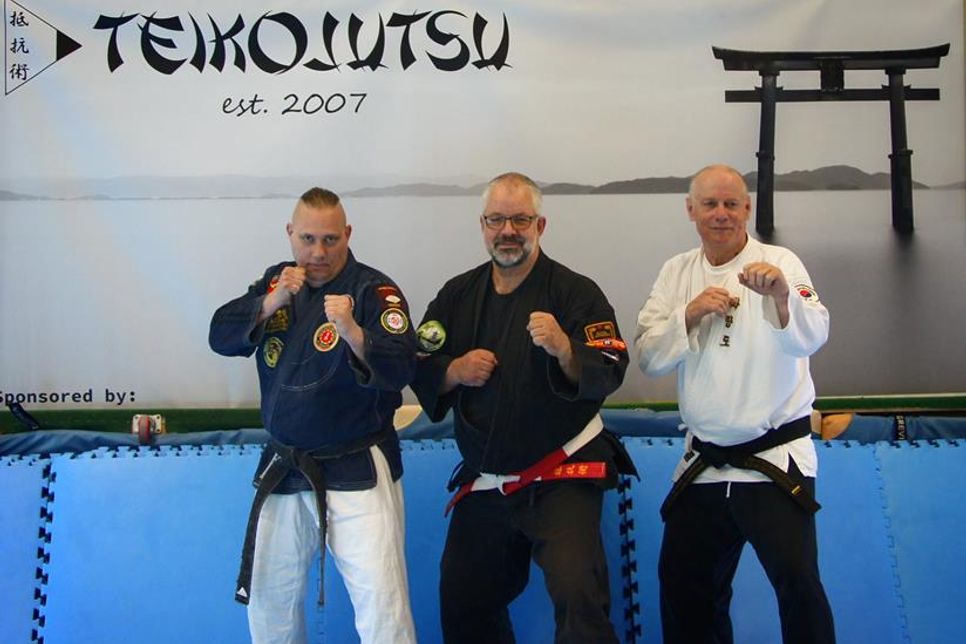 Heiko Brandt (8. Dan Jiu-Jitsu), Olaf Laur (6. Dan Teikojutsu) und Michael Baumann (2. Dan Hwarangdo) (v. lks.).