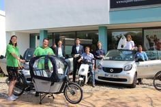 Die Kooperationspartner des E-Mobilitäts-Angebotes mit einem Teil der Fahrzeugflotte.