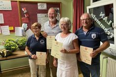 Die Geehrten: Christiane Weber, Elke und Reimer Peters, Dirk Helbach (v. lks.).